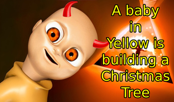 A baby in Yellow is building a Christmas Tree